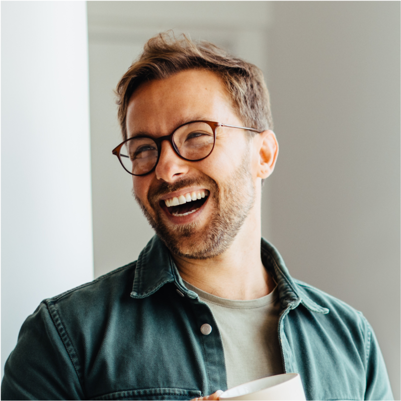 Cheerful Man in Teal Shirt